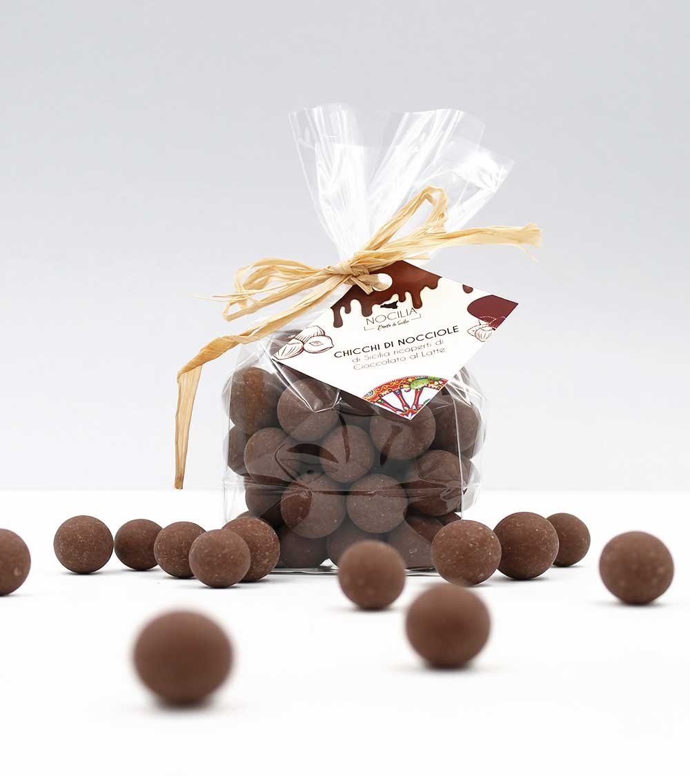 Feijões de avelã com cobertura de chocolate de leite | Envelope com flocos 150g